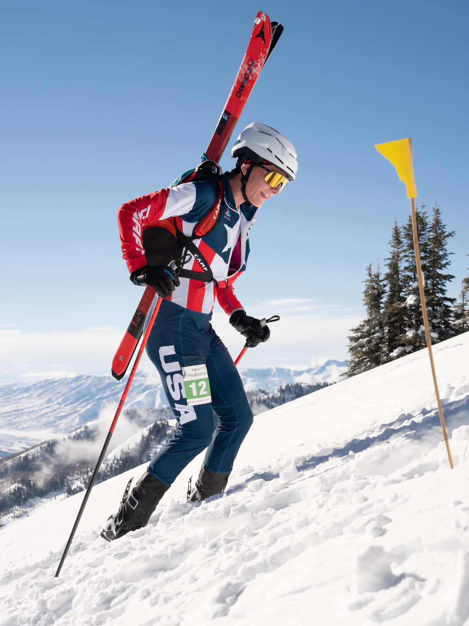 Griffin Briley climbs a hill during a race. Ron Winsett Images